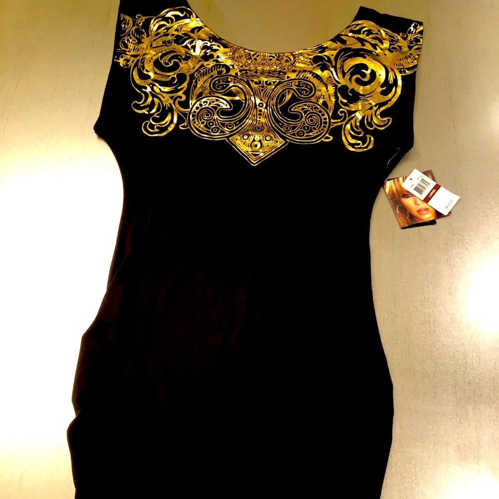 Size large, black, and gold dress. Derwin